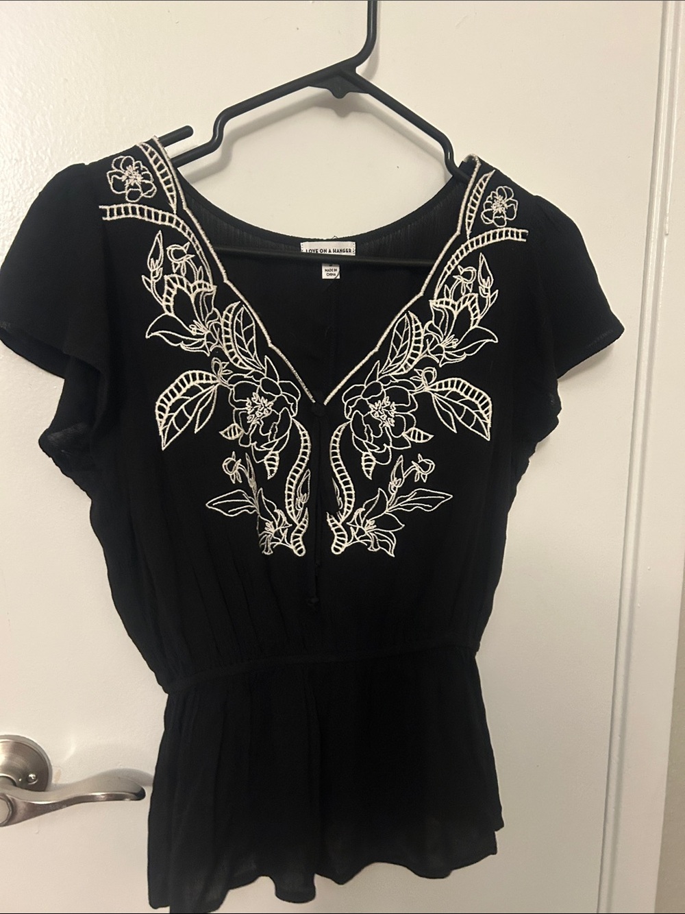 love on a hanger Black Short Sleeve V-Neck Top with White Floral Embroidery